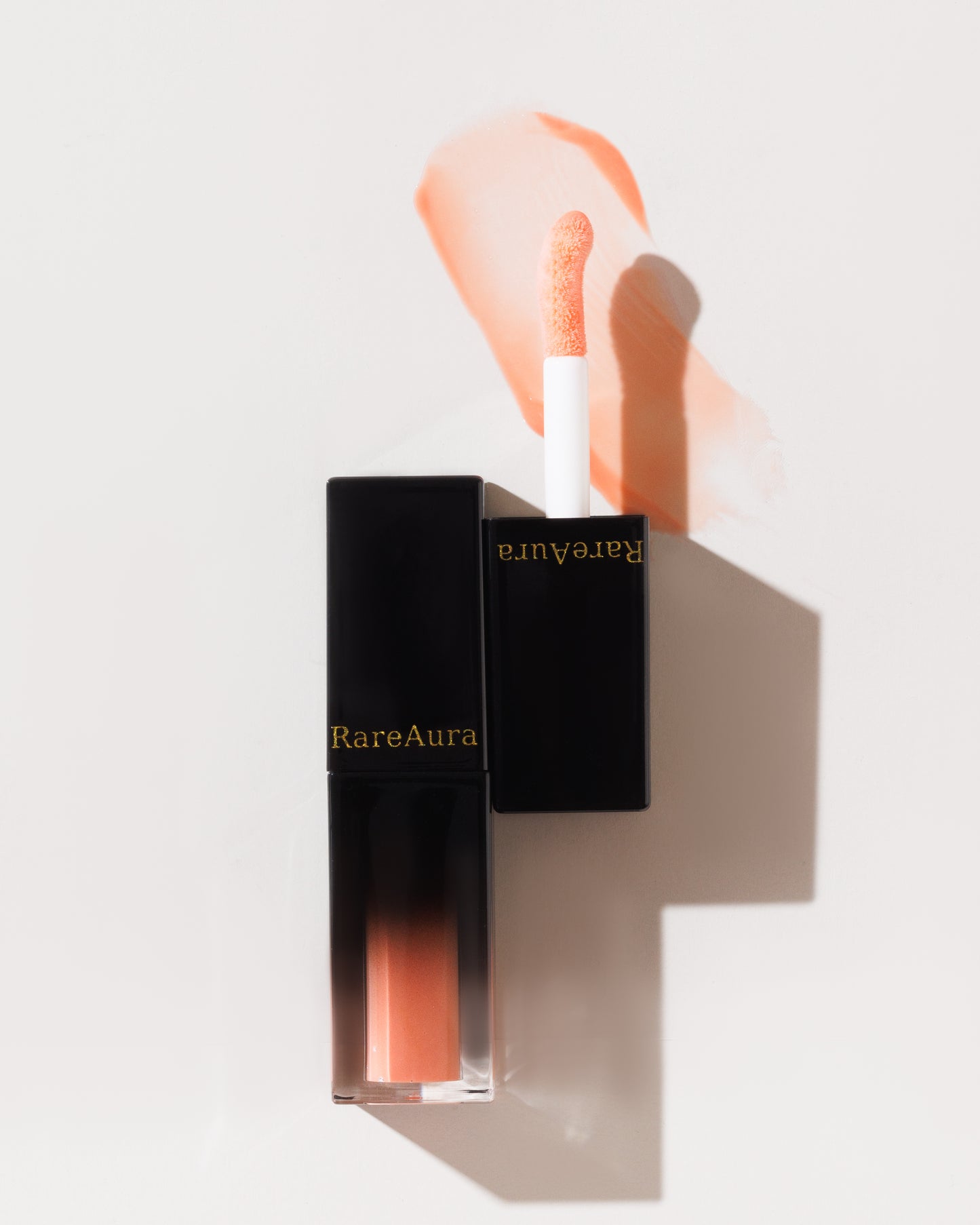 RareAura Harmony Gloss – Peachy Coral